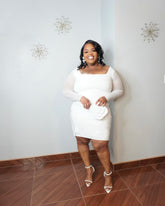 Plus size rhinestone mini dress with sheer sleeves