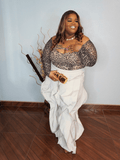 Oversized flowy statement pants for plus size women with elastic waistband styled with leopard top