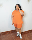 Full body view of plus size casual matching set with sneakers