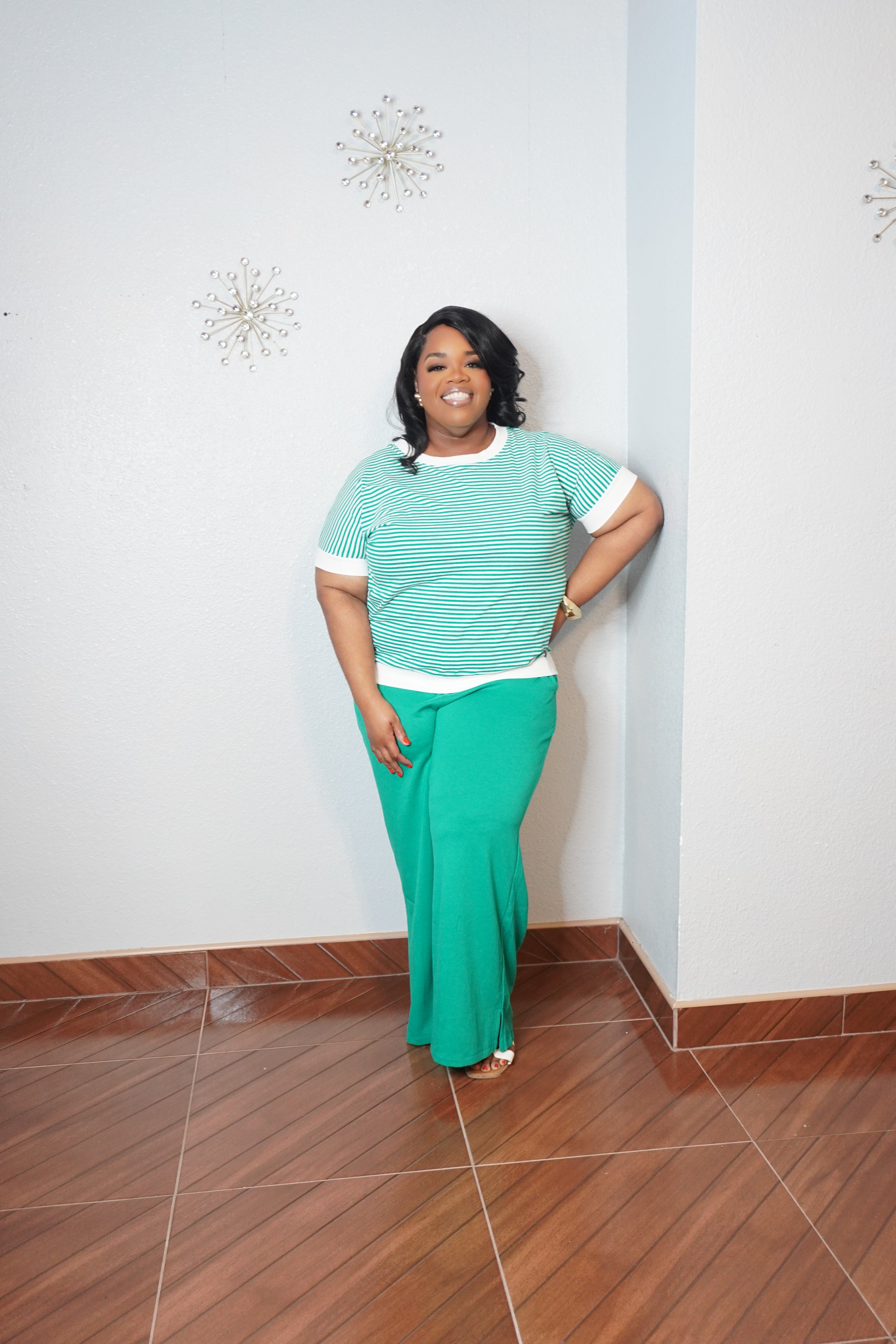 Plus size green and white striped knit top