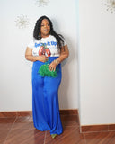 Plus size woman wearing white chili pepper graphic t-shirt with stretchy fit