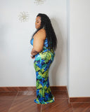 Side view of plus size tropical halter maxi dress with stretch fabric