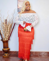 Plus size red fringe maxi skirt styled with lace top and heels front view
