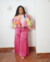 Rosé pink satin wide leg pants with relaxed fit and high waist styled for a luxury women's boutique outfit