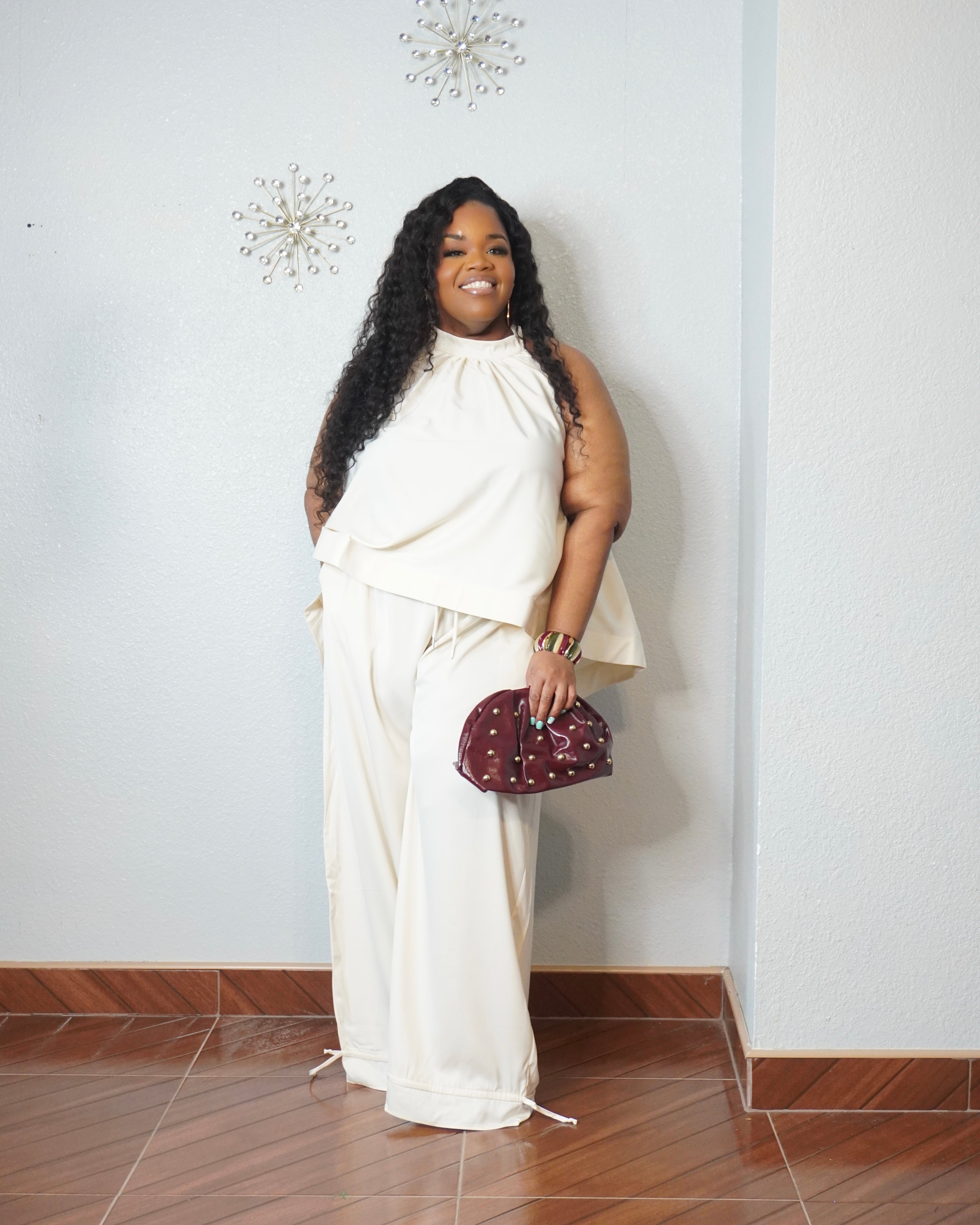 Wide leg pants styled with drawstring ankle