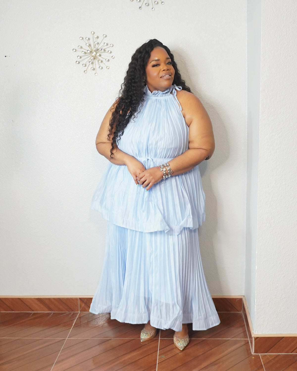 Curvy woman wearing elegant blue maxi dress