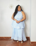 Curvy woman wearing elegant blue maxi dress