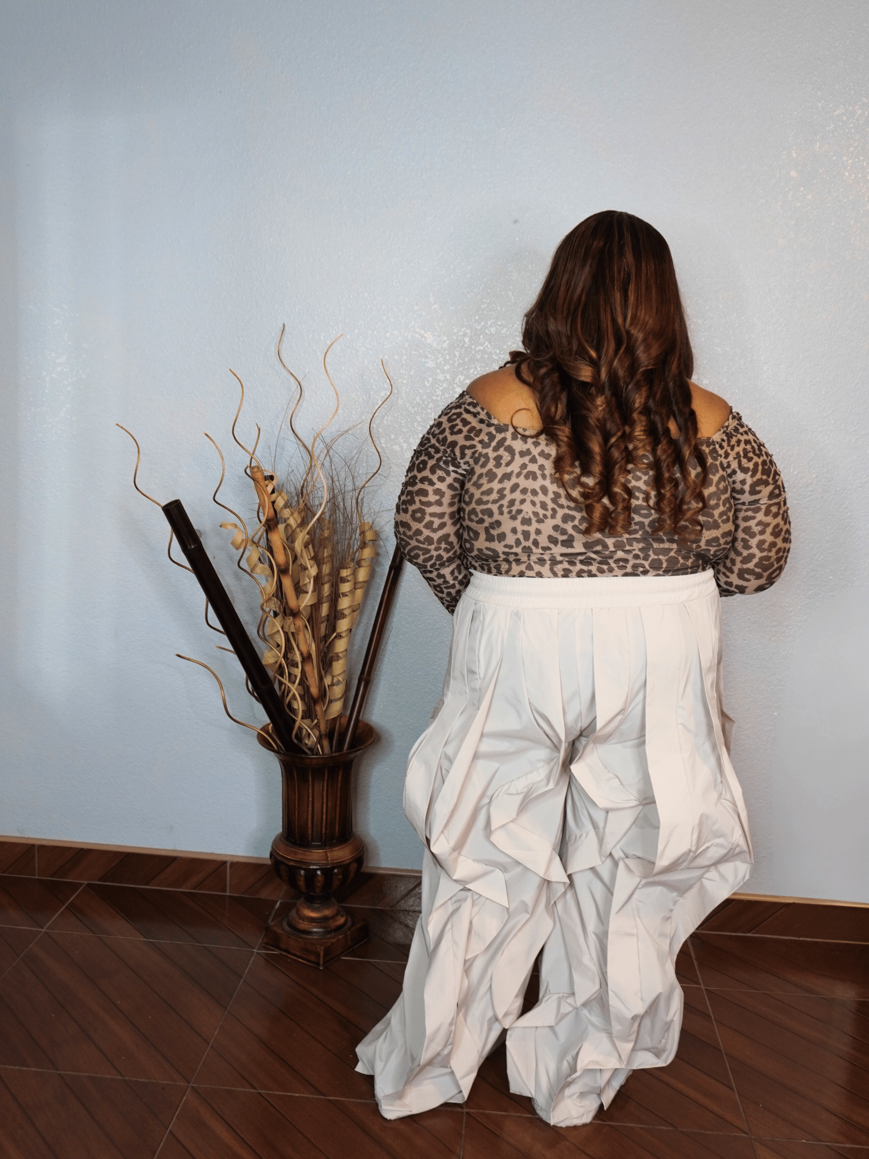 Oversized flowy statement pants for plus size women with elastic waistband styled with leopard top
