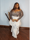 Leopard keyhole long sleeve stretch top front view for plus size women styled with statement wide leg pants
