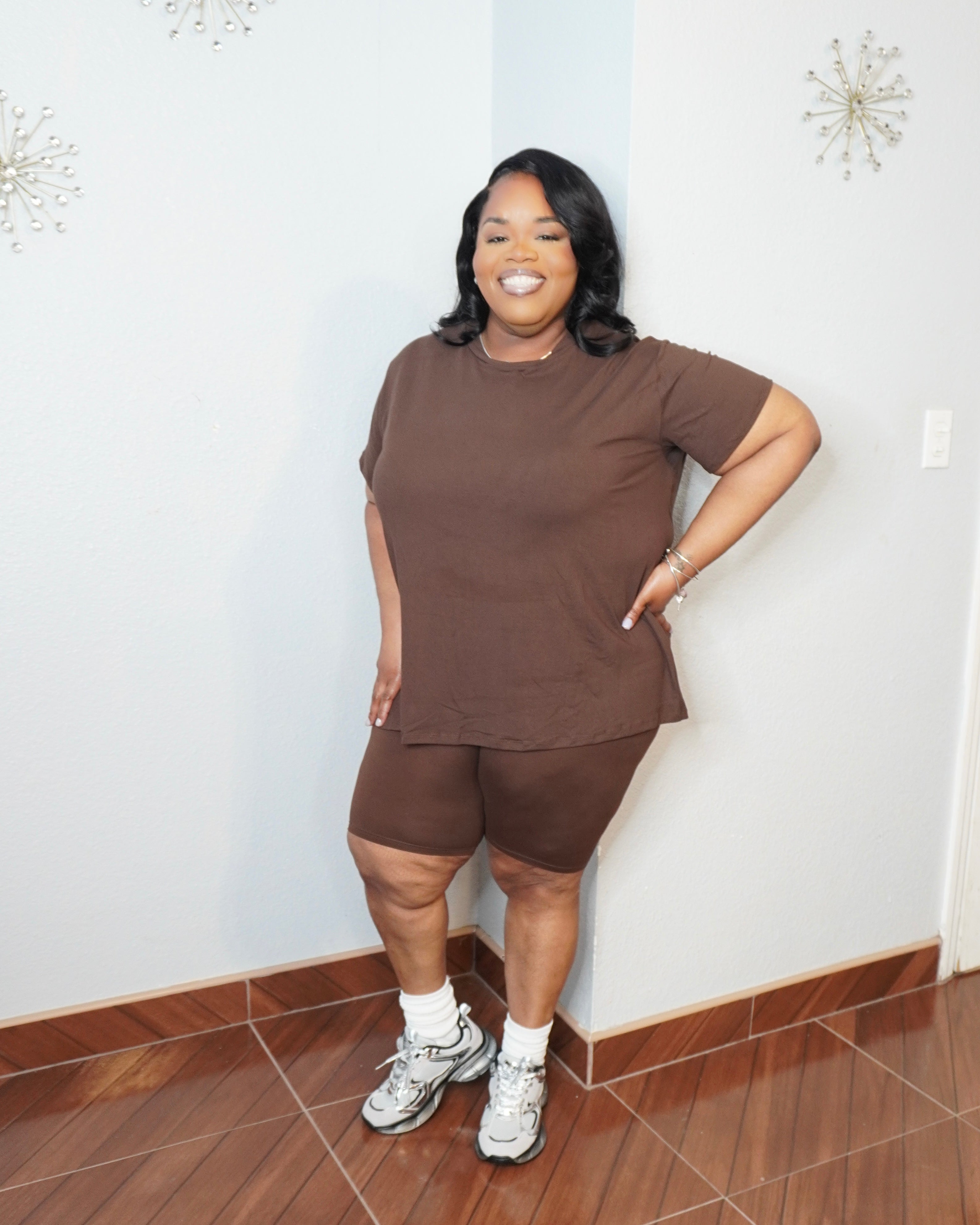 Side view of plus size biker short set showing stretch and fit