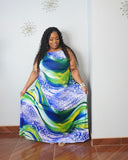 Plus size model showing full length stretch maxi dress silhouette