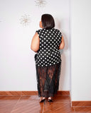Back view of plus size black and white polka dot lace dress