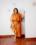 Plus size woman wearing golden two piece set