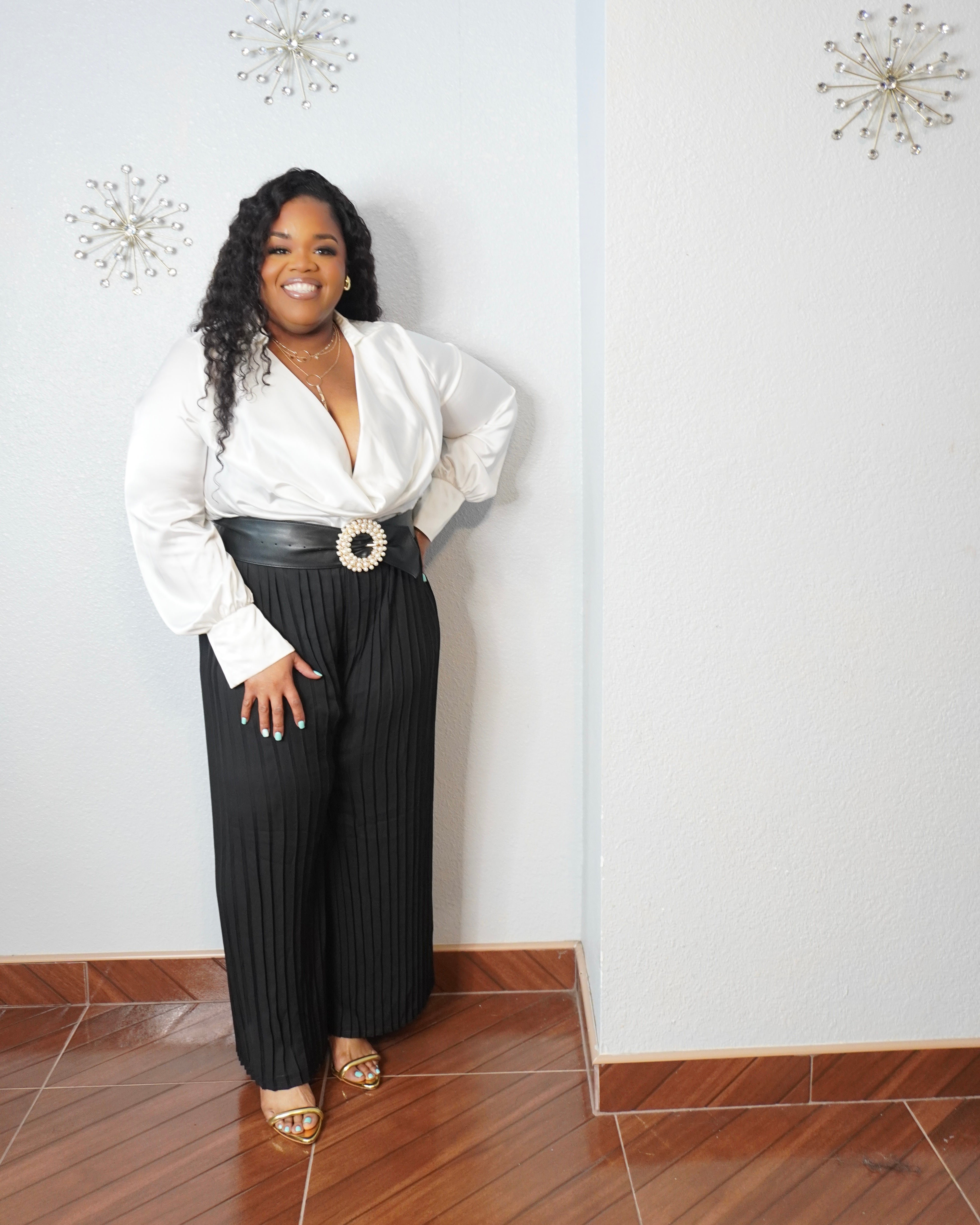 Black plus size wide-leg pants with vertical pleated texture