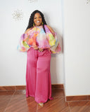 Rosé pink satin wide leg pants with relaxed fit and high waist styled for a luxury women's boutique outfit